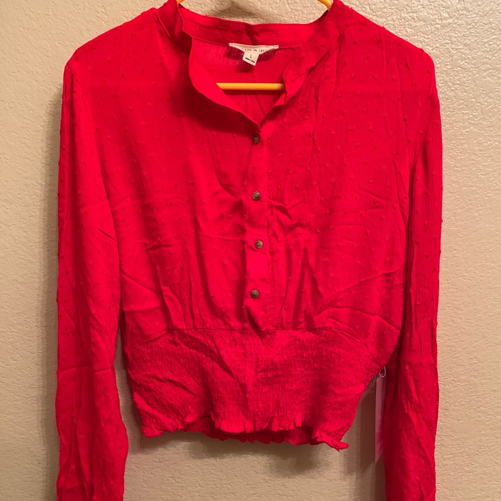 NanaMac’s shirt. Long sleeve, tight waist but not too tight, very comfy